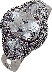 Ring aus echtem Silber Sterlingsilber 925/- mit weißem Topas, und ca. 20 Zirkoniasteinen. Breite ca. 14mm und Stärke ca. 3mm. Die Oberfläche ist rhodiniert und poliert. Zum Schnäppchenpreis von Abramowicz/Stuttgart